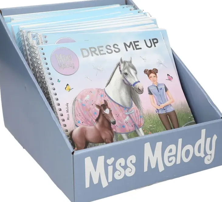 Miss melody dress me up tarrakirja